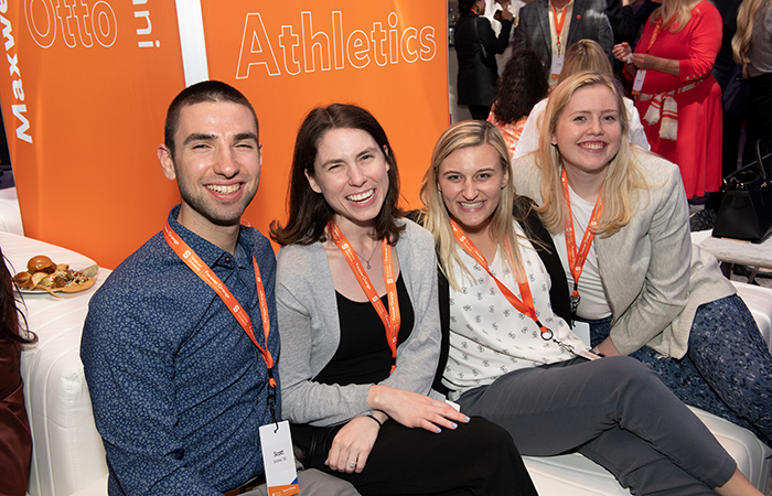 Young alumni enjoy the reception.
